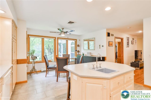 3745 Orefield Rd, South Whitehall Twp, PA 18104 - kitchen with a ceiling fan, recessed lighting, light countertops, a center island with sink, and dishwasher