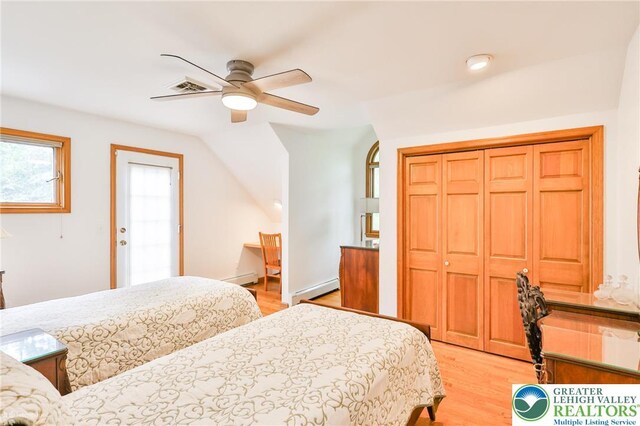 3745 Orefield Rd, South Whitehall Twp, PA 18104 - bedroom featuring a baseboard heating unit, light wood-style floors, and a closet