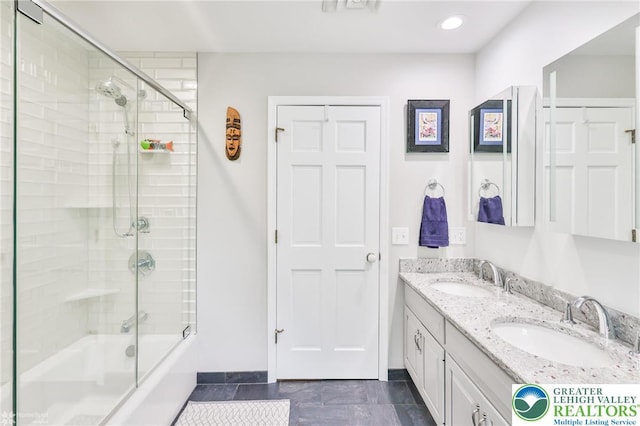 3745 Orefield Rd, South Whitehall Twp, PA 18104 - bathroom featuring bath / shower combo with glass door, double vanity, and recessed lighting