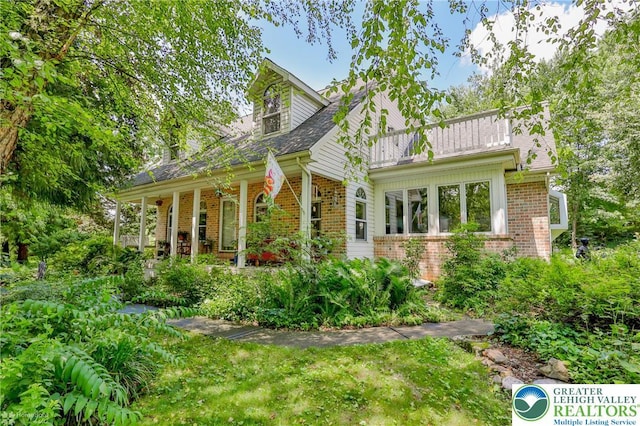 3745 Orefield Rd, South Whitehall Twp, PA 18104 - view of front of house featuring brick siding and a porch