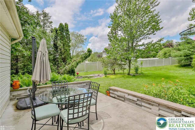 3745 Orefield Rd, South Whitehall Twp, PA 18104 - fenced backyard with outdoor dining space and a patio