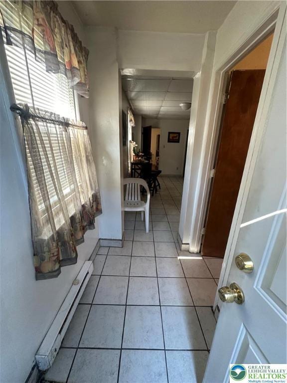172 Tilghman St, Allentown City, PA 18102 - hall featuring baseboard heating and light tile patterned flooring