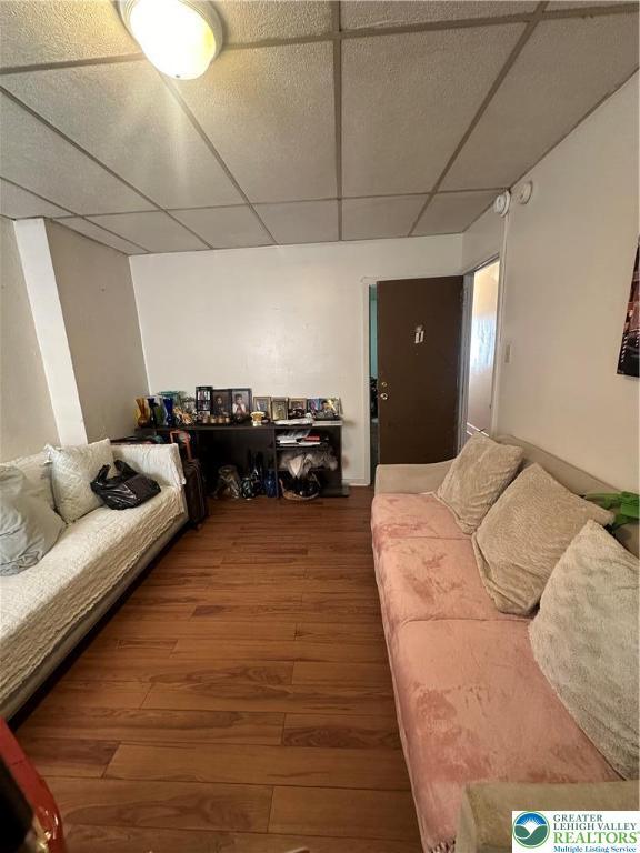 172 Tilghman St, Allentown City, PA 18102 - living area featuring a paneled ceiling and wood finished floors