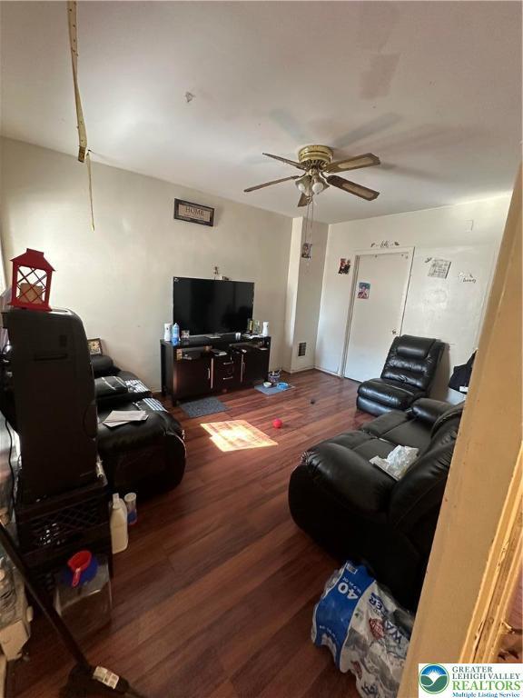 172 Tilghman St, Allentown City, PA 18102 - living area with wood finished floors and ceiling fan