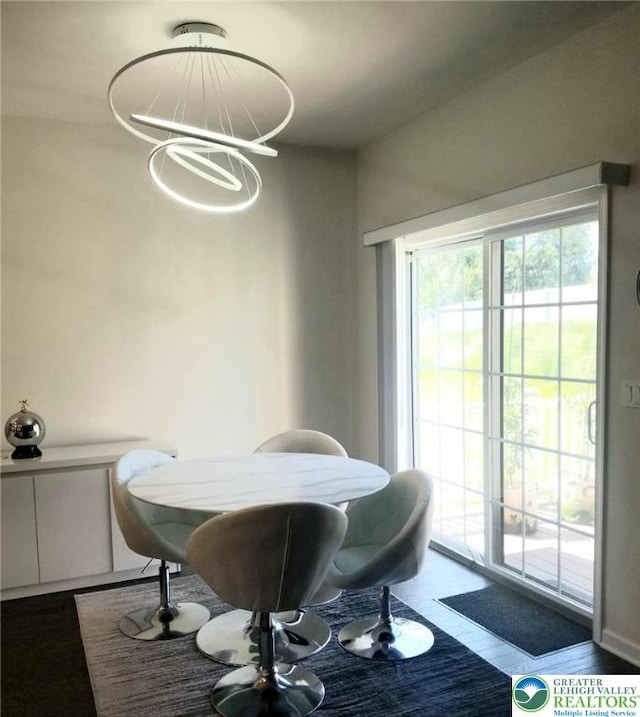 3583 Daylily Dr, Upper Milford Twp, PA 18049 - dining room with a chandelier and wood finished floors