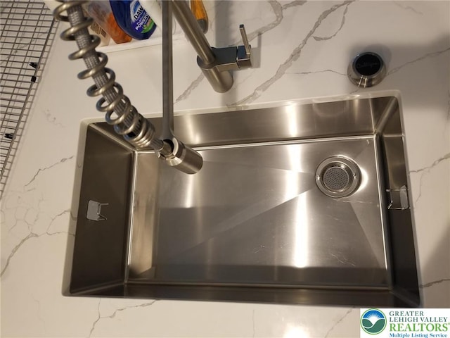 3583 Daylily Dr, Upper Milford Twp, PA 18049 - kitchen view of a sink and stone countertops