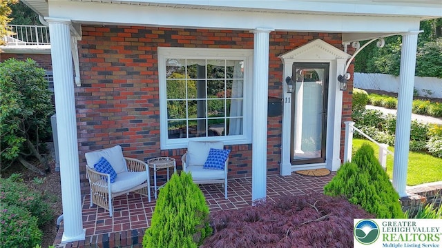 11 11 Ave, D, PA 17972 - doorway to property featuring brick siding and a porch