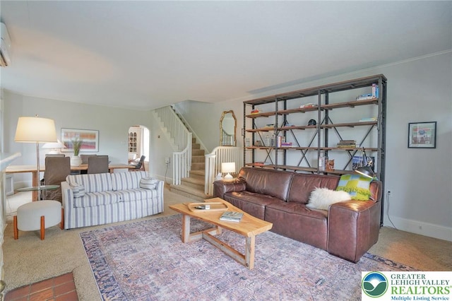11 11 Ave, D, PA 17972 - living area featuring stairway, carpet floors, and arched walkways