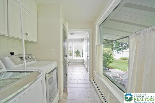 11 11 Ave, D, PA 17972 - washroom featuring washer and dryer, cabinet space, a baseboard heating unit, and light tile patterned floors