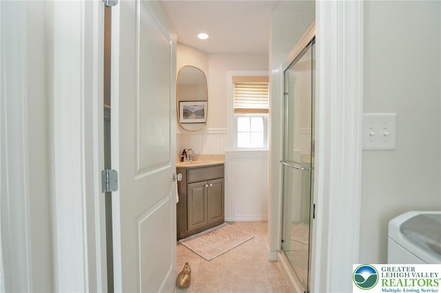 11 11 Ave, D, PA 17972 - bathroom with vanity, a shower stall, tile patterned flooring, and a wainscoted wall
