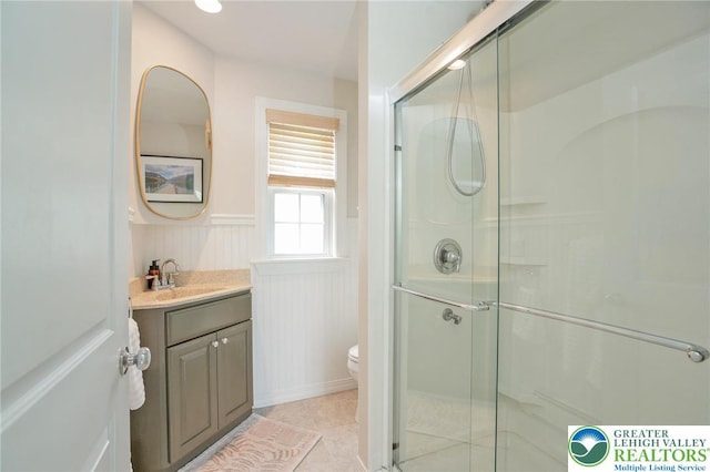 11 11 Ave, D, PA 17972 - full bath with vanity, a stall shower, wainscoting, and tile patterned flooring