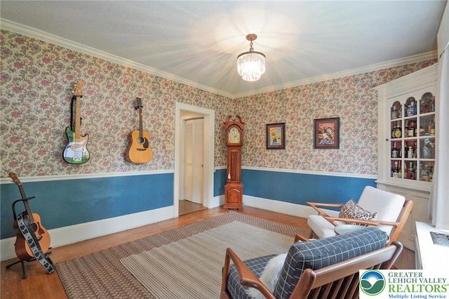 11 11 Ave, D, PA 17972 - living area featuring wainscoting, wood finished floors, a chandelier, and crown molding