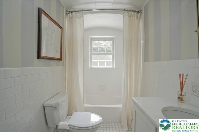 11 11 Ave, D, PA 17972 - bathroom with tile walls, vanity, shower / bathtub combination with curtain, and a wainscoted wall