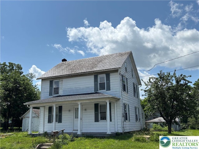 565 Moorestown Dr, Moore Twp, PA 18014 - view of front of property with covered porch and a chimney