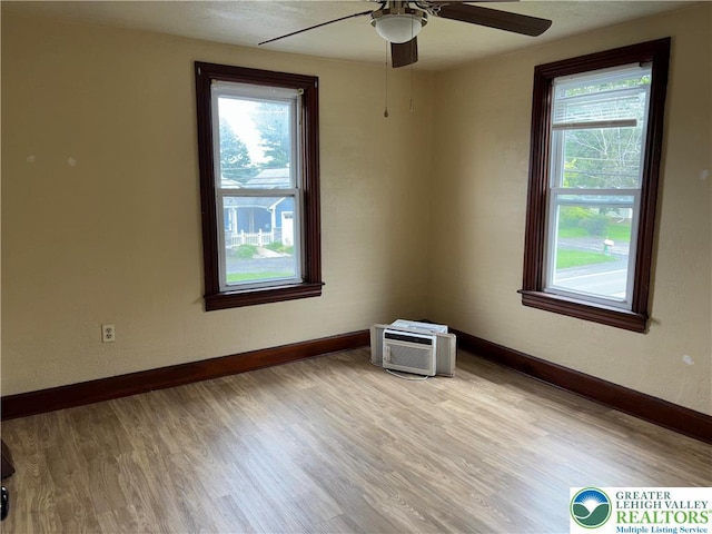 565 Moorestown Dr, Moore Twp, PA 18014 - empty room with plenty of natural light, a ceiling fan, and light wood-style floors