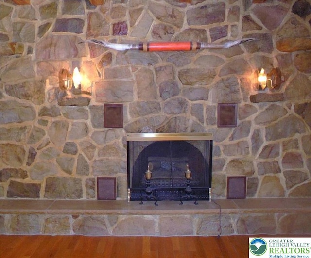 2546 Wehr Mill Rd, South Whitehall Twp, PA 18069 - detailed view of wood finished floors and a fireplace
