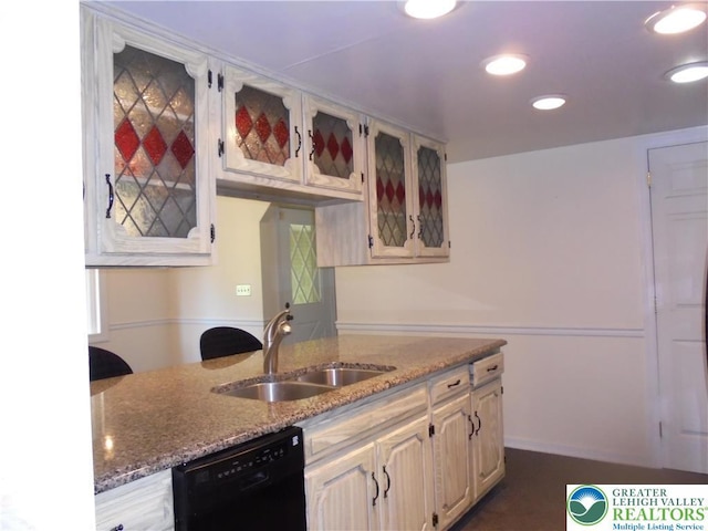 2546 Wehr Mill Rd, South Whitehall Twp, PA 18069 - kitchen featuring black dishwasher, glass insert cabinets, light stone counters, and recessed lighting