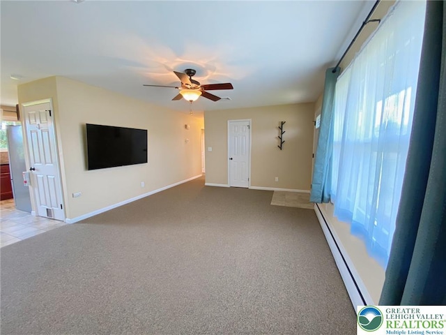 3111 Pheasant Dr, Moore Twp, PA 18067 - unfurnished living room with a baseboard heating unit, light carpet, and ceiling fan