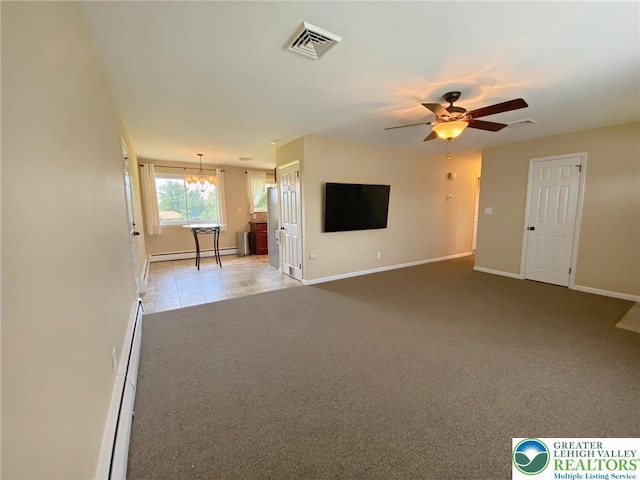 3111 Pheasant Dr, Moore Twp, PA 18067 - unfurnished living room with a baseboard radiator, light colored carpet, a baseboard heating unit, ceiling fan, and a chandelier