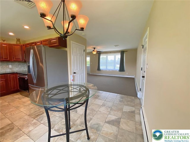 3111 Pheasant Dr, Moore Twp, PA 18067 - kitchen with stainless steel fridge, a baseboard heating unit, a chandelier, dishwashing machine, and a baseboard radiator