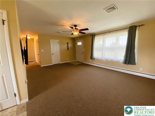 3111 Pheasant Dr, Moore Twp, PA 18067 - unfurnished room featuring a baseboard radiator, a ceiling fan, and carpet floors