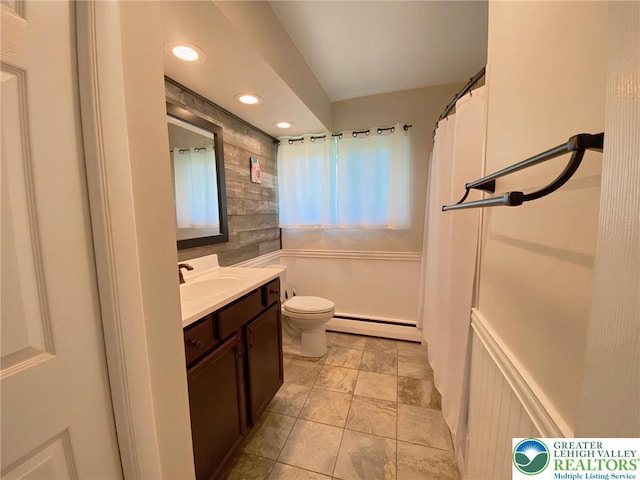3111 Pheasant Dr, Moore Twp, PA 18067 - full bath featuring a baseboard radiator, vanity, recessed lighting, and tile walls