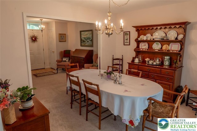 104 Garden Ct, Emmaus Boro, PA 18049 - dining room featuring a chandelier and light carpet