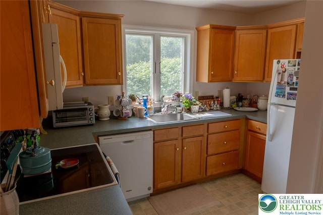 104 Garden Ct, Emmaus Boro, PA 18049 - kitchen featuring white appliances and a sink
