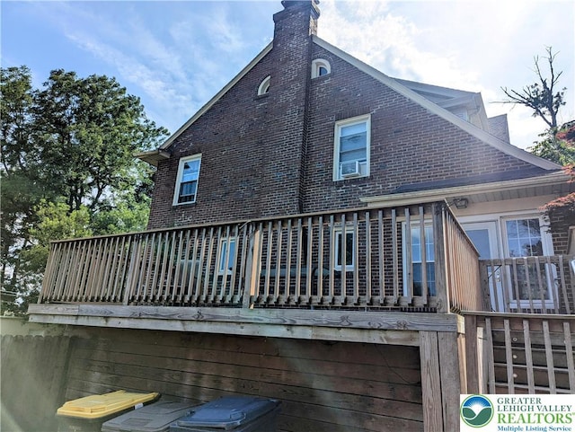2816 W Columbia St, South Whitehall Twp, PA 18104 - back of house with brick siding, cooling unit, a chimney, and a deck
