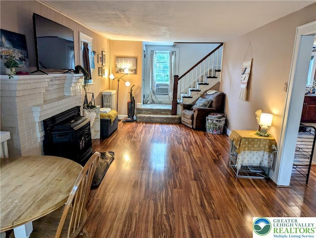 2816 W Columbia St, South Whitehall Twp, PA 18104 - living room featuring wood finished floors, stairway, cooling unit, and a wood stove