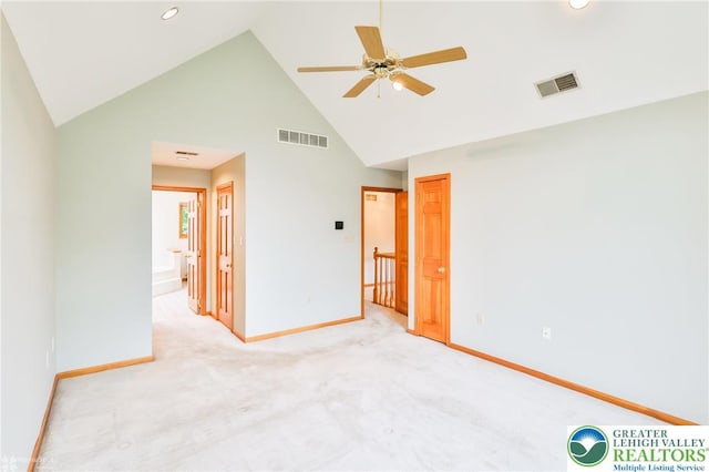 6242 Domarray St, Upper Saucon Twp, PA 18036 - unfurnished bedroom featuring high vaulted ceiling, light carpet, recessed lighting, and ensuite bathroom