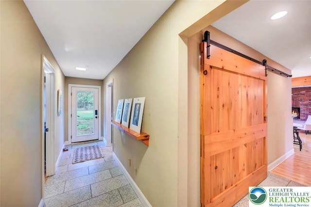 938 Meadow Cir, Bethlehem City, PA 18017 - hallway featuring baseboards and a barn door