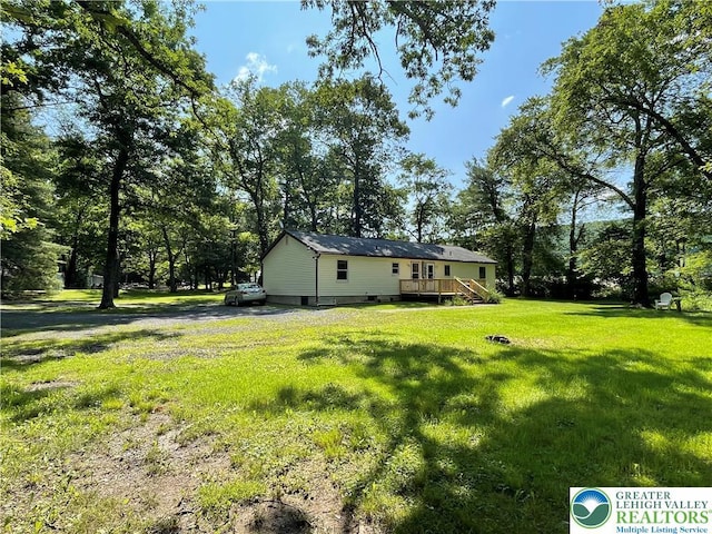 849 Weir Lake Rd, Chestnuthill Twp, PA 18058 - view of green lawn featuring a deck