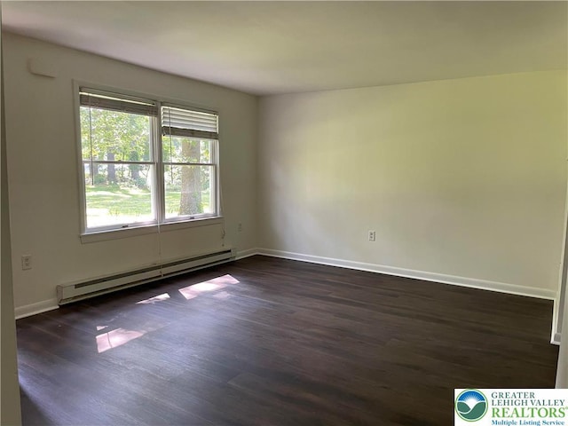 849 Weir Lake Rd, Chestnuthill Twp, PA 18058 - unfurnished room with a baseboard heating unit and dark wood finished floors