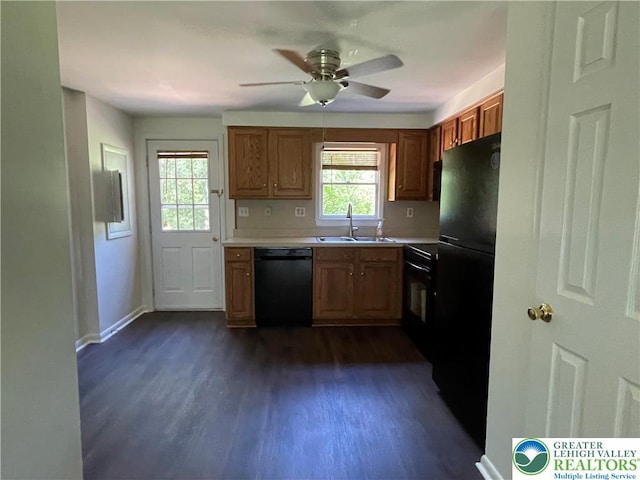 849 Weir Lake Rd, Chestnuthill Twp, PA 18058 - kitchen featuring black appliances, dark wood-type flooring, a ceiling fan, and light countertops
