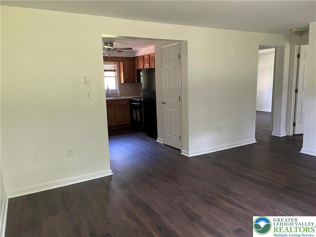 849 Weir Lake Rd, Chestnuthill Twp, PA 18058 - unfurnished living room with dark wood-style floors and ceiling fan