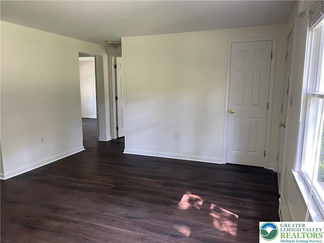 849 Weir Lake Rd, Chestnuthill Twp, PA 18058 - empty room with dark wood-type flooring and baseboards