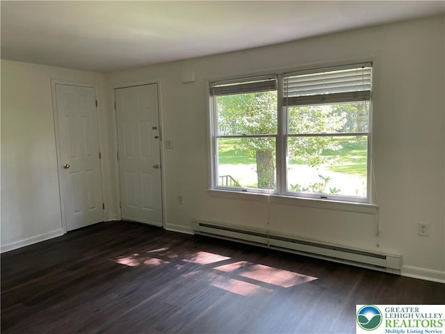 849 Weir Lake Rd, Chestnuthill Twp, PA 18058 - foyer with a baseboard heating unit, dark wood-style floors, and healthy amount of natural light