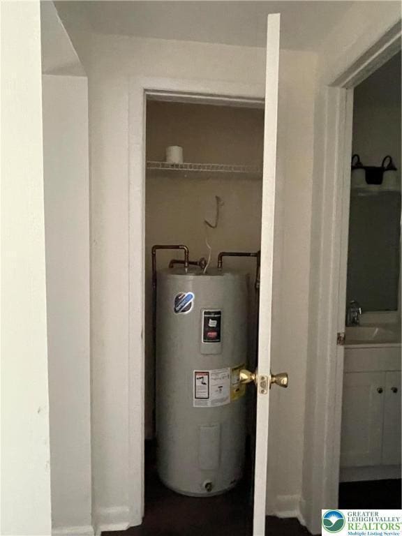 849 Weir Lake Rd, Chestnuthill Twp, PA 18058 - utilities with electric water heater and a sink