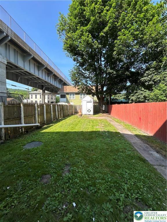 230 White St, Lehighton Boro, PA 18235 - fenced backyard featuring a shed