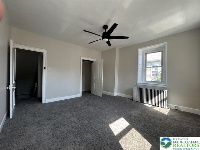 230 White St, Lehighton Boro, PA 18235 - unfurnished bedroom featuring radiator, dark carpet, ceiling fan, and a closet