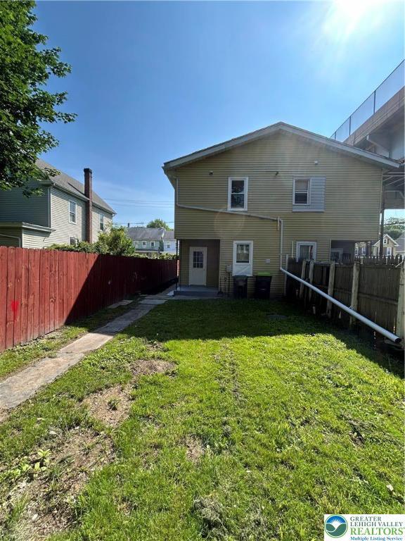230 White St, Lehighton Boro, PA 18235 - rear view of property with a fenced backyard