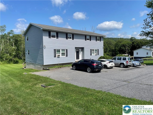 1295 Bunny Ln, Chestnuthill Twp, PA 18322 - view of front of property with a front lawn and uncovered parking