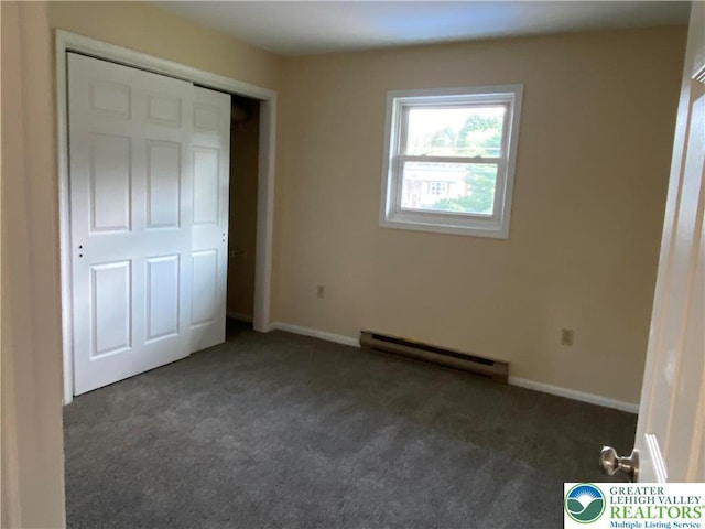 1295 Bunny Ln, Chestnuthill Twp, PA 18322 - unfurnished bedroom with baseboard heating, carpet flooring, and a closet