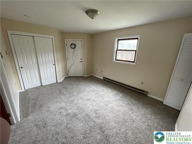 1295 Bunny Ln, Chestnuthill Twp, PA 18322 - unfurnished bedroom featuring baseboard heating, carpet, and a closet