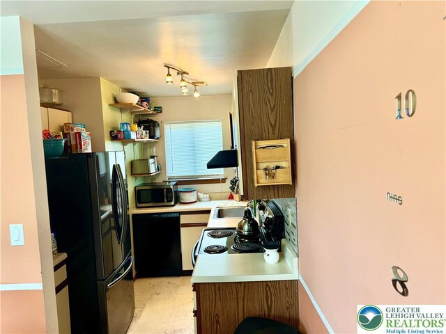 3353 Windermere Dr, Lehman Twp, PA 18324 - kitchen featuring black appliances, open shelves, and light countertops