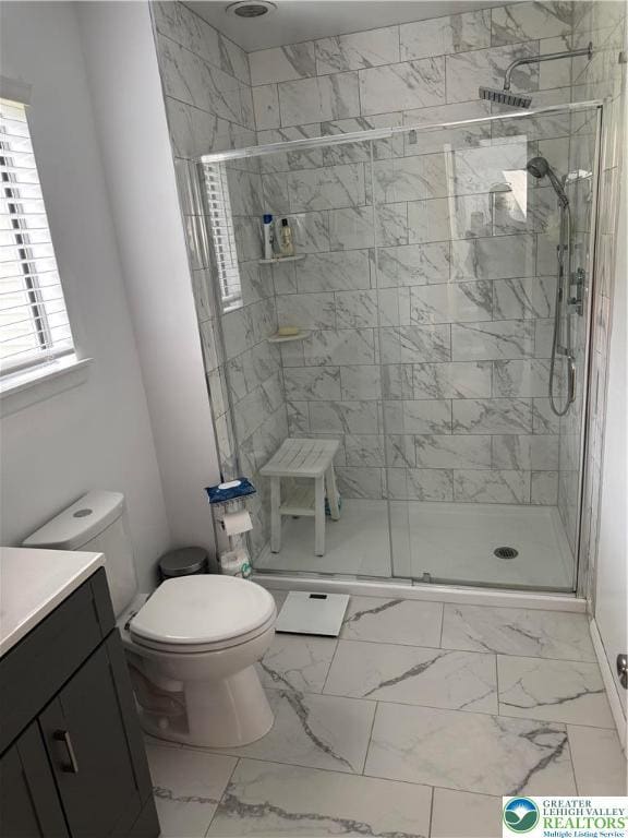 3353 Windermere Dr, Lehman Twp, PA 18324 - bathroom with vanity, marble look tiles, and a stall shower