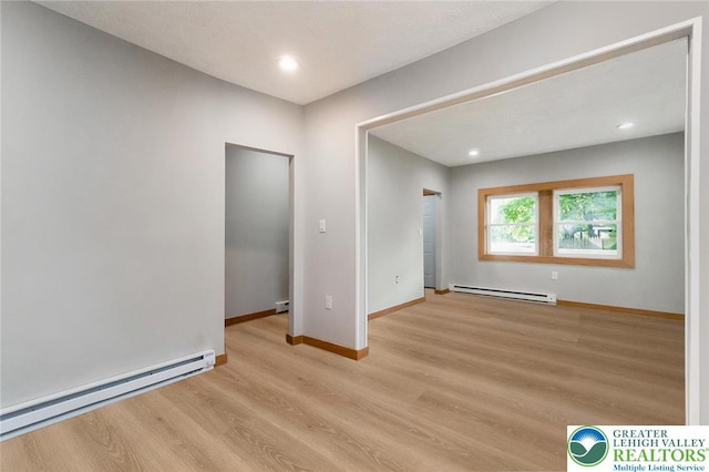 226 Fern St, Jim Thorpe Boro, PA 18229 - spare room featuring a baseboard radiator, light wood-type flooring, and recessed lighting