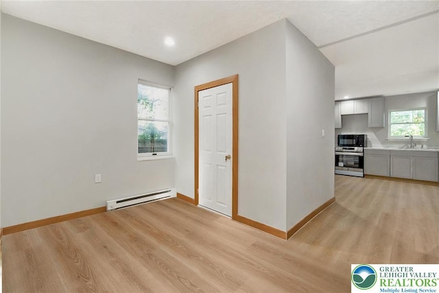 226 Fern St, Jim Thorpe Boro, PA 18229 - unfurnished room featuring a baseboard heating unit, light wood-type flooring, and recessed lighting