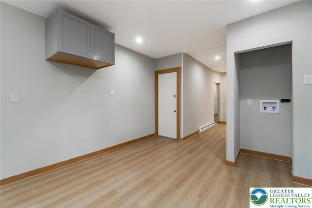 226 Fern St, Jim Thorpe Boro, PA 18229 - spare room featuring a baseboard radiator, light wood-type flooring, and recessed lighting